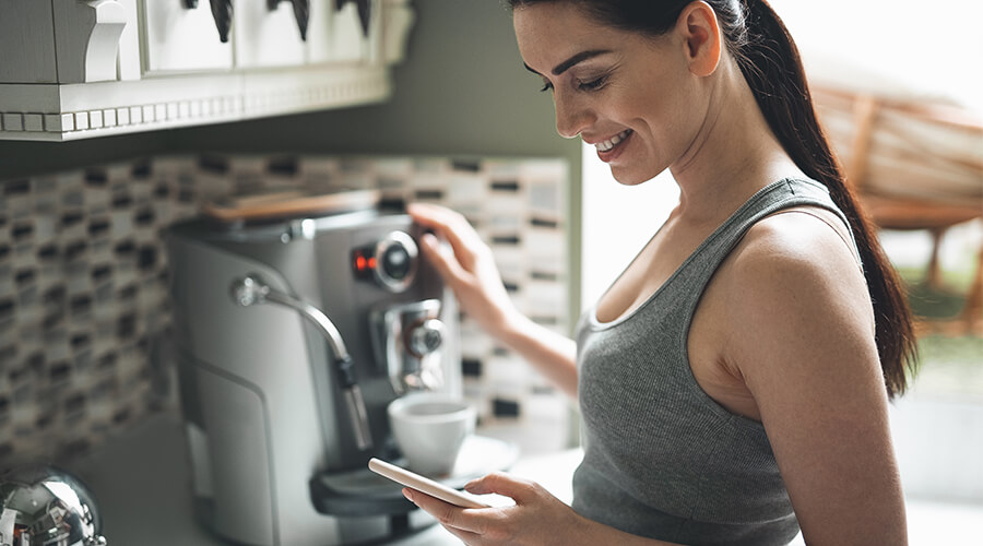woman and coffee machine