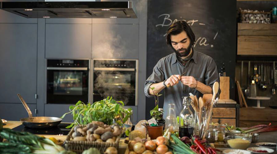 man peeling food