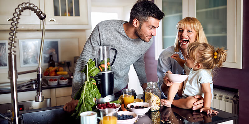 Family having fun in the kitchen